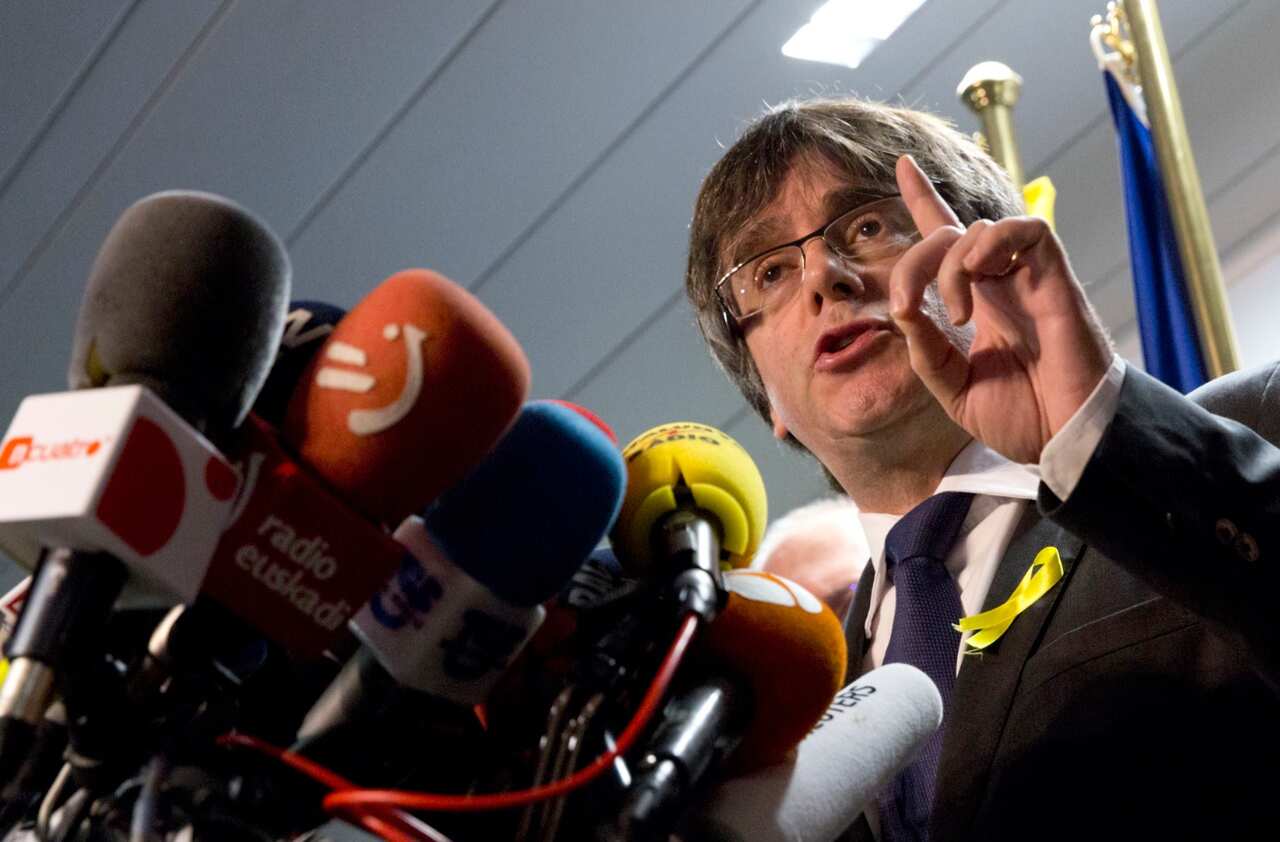 Ousted Catalan leader Carles Puigdemont speaks during a media conference in Brussels on Friday, Dec. 22, 2017. 
