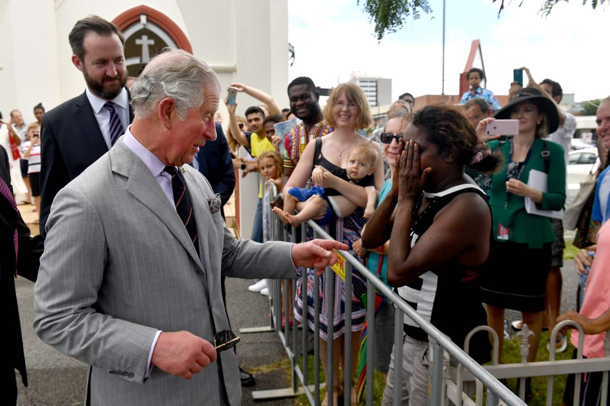 Prince Charles meets with a tearful Elizabeth Kulla Kulla after Sunday church service at St John's Anglican Church in Cairns.