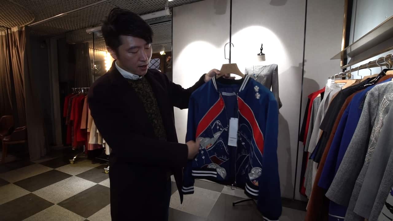 Beijing fashion designer Chen Xing tries to promote Chinese elements in his clothing