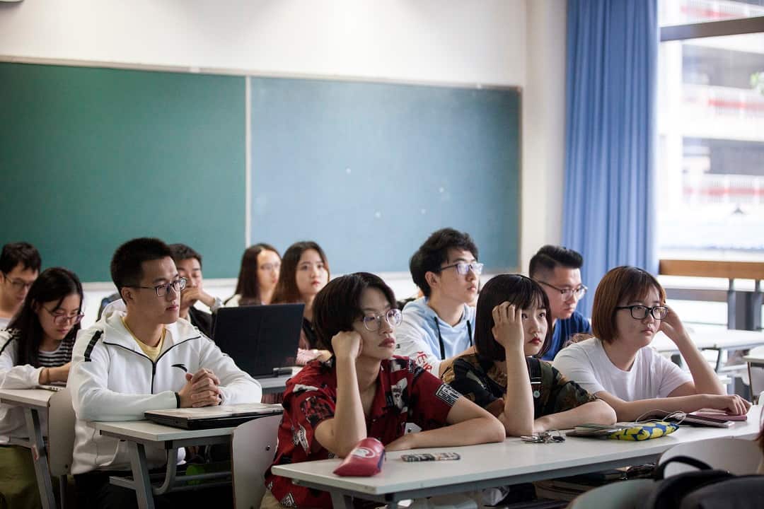 Students watch Feng Wuzhong’s online lecture during a course on Maoist ideology at Tsinghua University in Beijing, May 20, 2018.