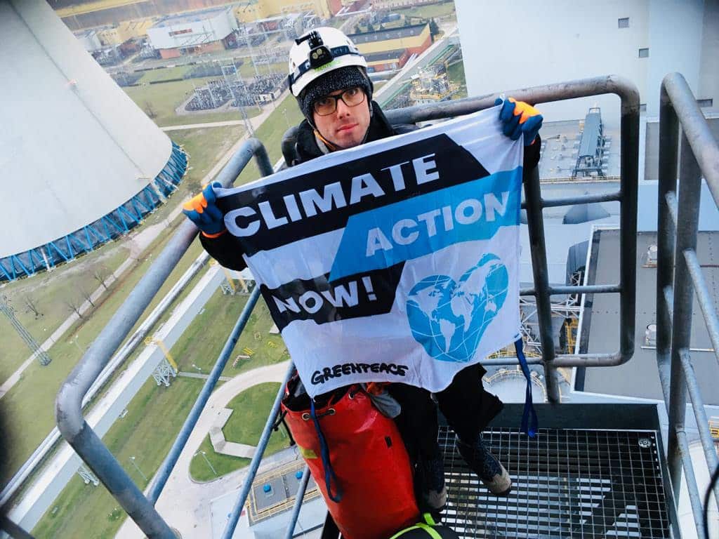 Greenpeace activist who climbed a 180m chimney ahead of Poland's climate summit.