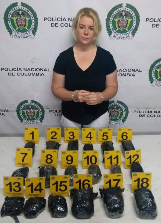 This April 12, 2017 photo released by Colombia's National Police press shows Australian Cassandra Sainsbury in handcuffs after she was arrested (AAP)