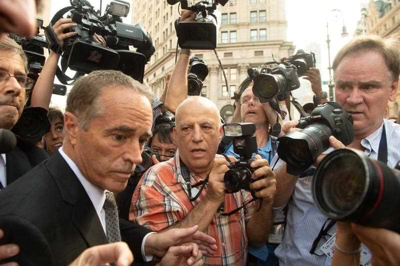 US Congressman Chris Collins faces the media.