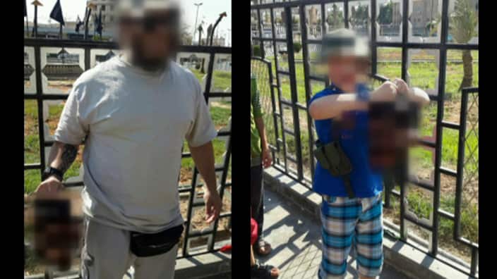 Boy believed to be Australian Khaled Sharrouf's son holds the decapitated head of a soldier.