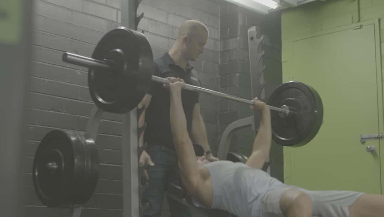 Craig with client at a Core9 gym. 