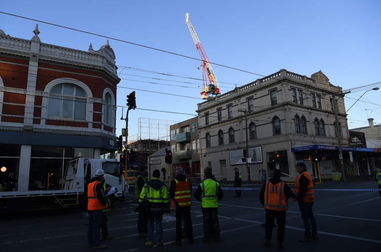 A damaged crane is seen in Richmond, Melbourne, Tuesday, July 24, 2018