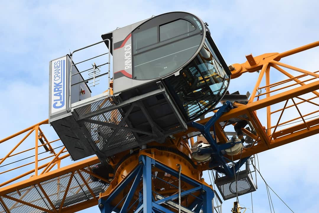 A crane is seen at the scene of an accident.
