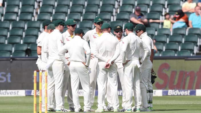 Australian captain Tim Paine instructs players in huddle prior to the start of the Fourth Test match between South Africa and Australia.
