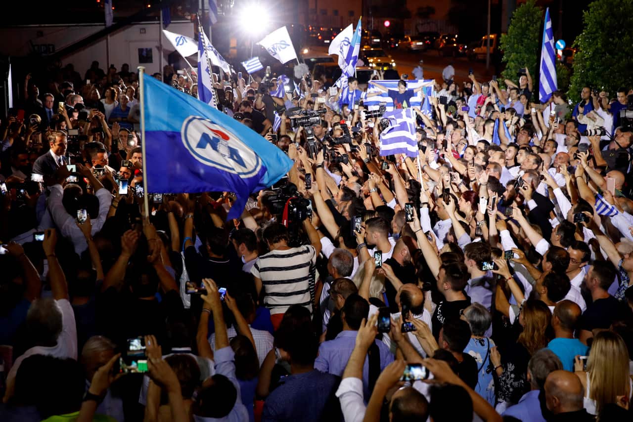Greek opposition New Democracy conservative party leader Kyriakos Mitsotakis talks to his supporters.