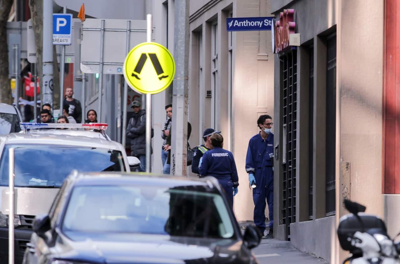 Police investigate a crime scene at the EQ Arcade building on A'Beckett Street in Melbourne, Saturday, July 21, 2018.