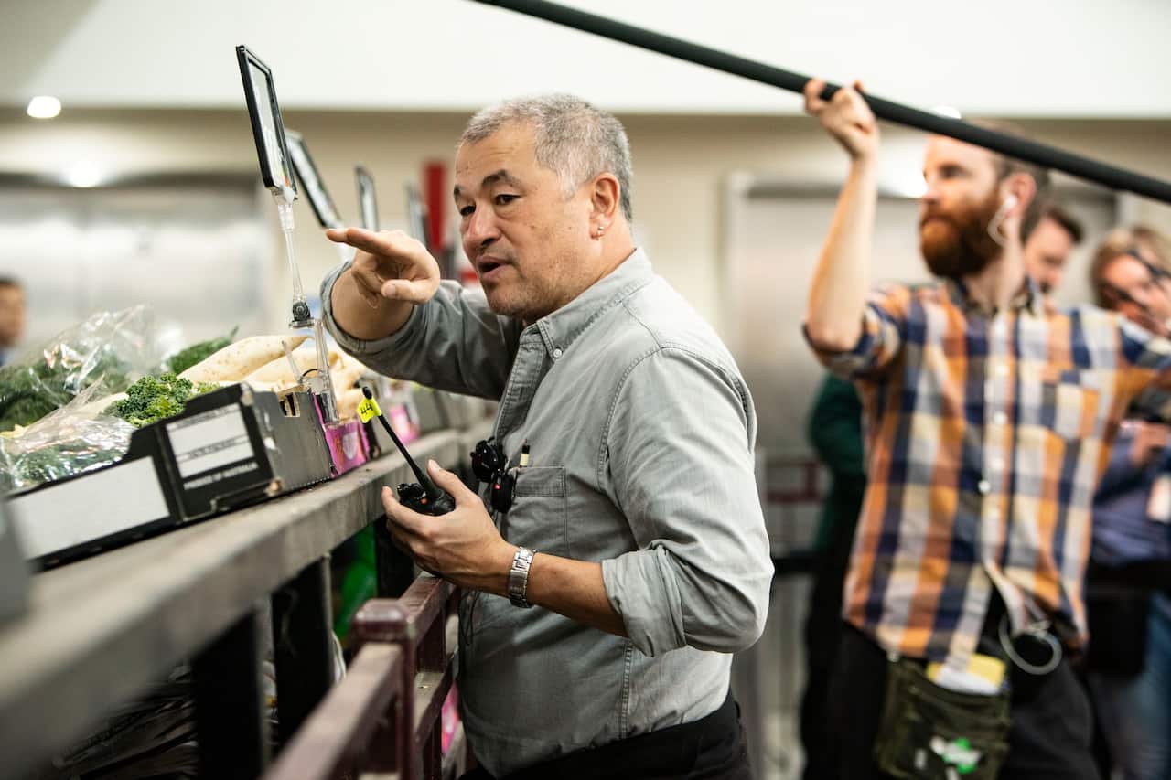 Director Shawn Seet on set.