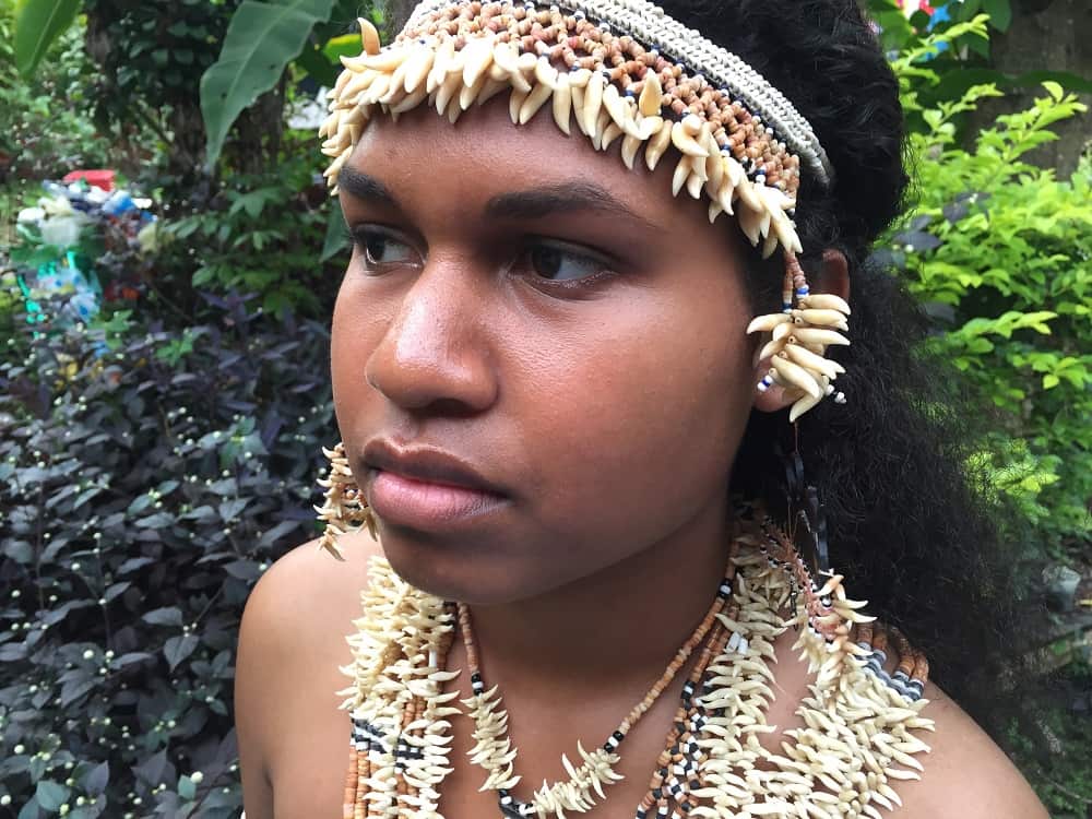 Jo Sigimanu dressed in traditional Fanalei wedding costume made of coral and dolphin teeth.
