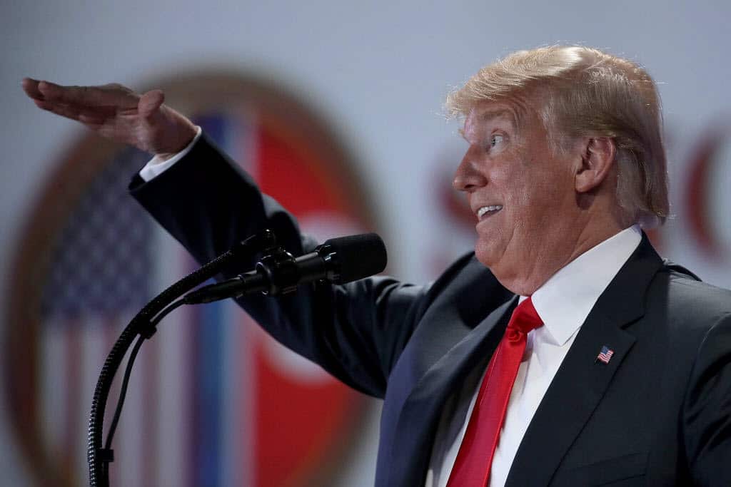 President Donald Trump answers questions during a press conference.