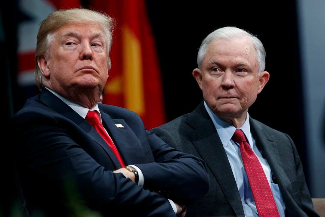 President Donald Trump sits with Attorney General Jeff Sessions during the FBI National Academy graduation ceremony, Friday, Dec. 15, 2017, in Quantico, Va. (AP Photo/Evan Vucci)