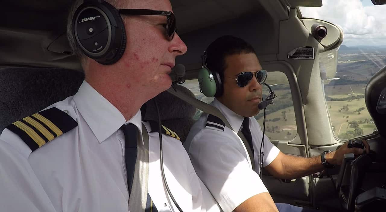 Student Robert Wright takes flight with an instructor.