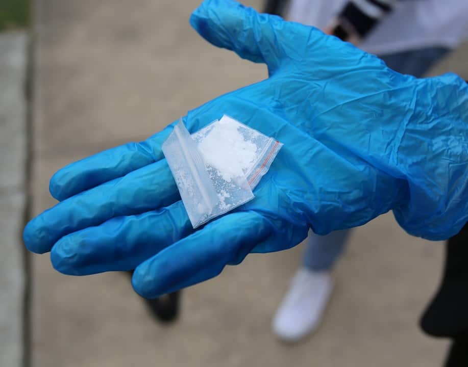 Police display some of the drugs found at the man;s home.