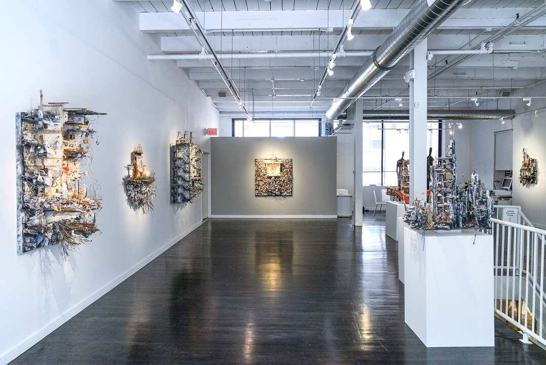 Mohamad Hafez's art exhibit with his models on show.