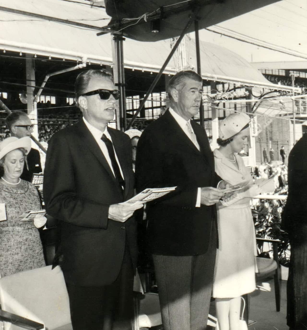 Billy Graham (centre) with then NSW Governor Roden Cutler at Sydney's Randwick Racecourse.