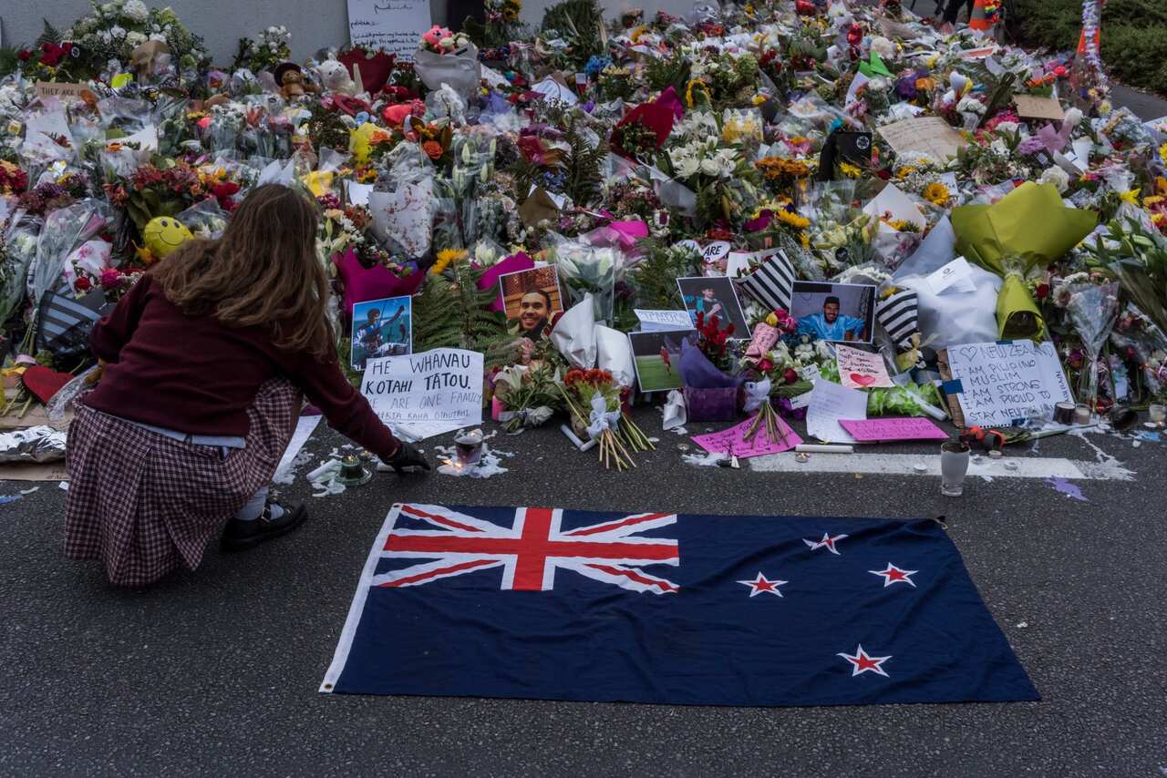 Mourners pay their respects for the 50 people slain in the mosque attack.