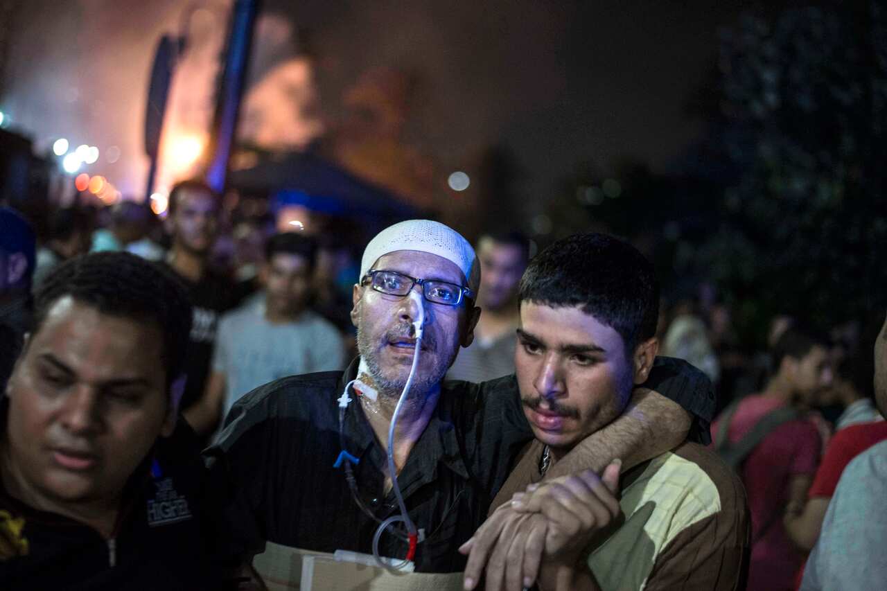 A patient is taken from the cancer clinic following the deadly blast. 