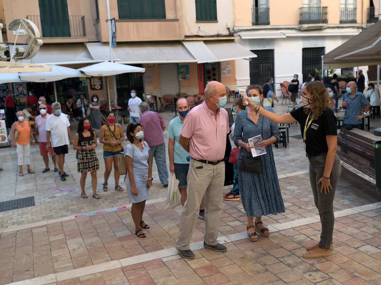 Checking temperatures outside a cinema in Malaga, Spain, on Aug. 30, 2020. 
