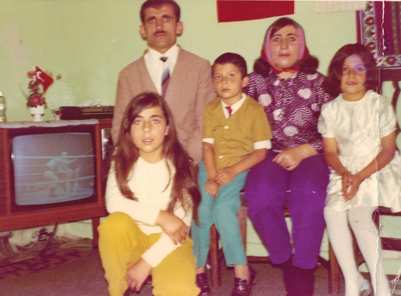 Muradiye Selvi (in a white dress) arrived in Melbourne with her family as a child. 