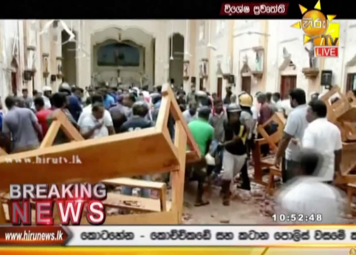 This image made from video provided by Hiru TV shows damage inside a church after a blast in Colombo, Sunday, April 21, 2019.