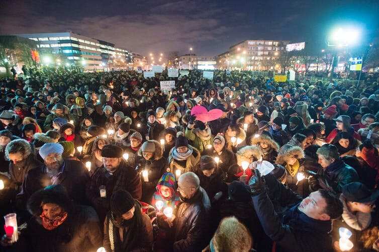 After the Québec mosque shooting, the majority of people on social media made supportive comments but some trolls tried to stoke hate. Here people attend a Montréal vigil for the Québec City victims on January 30, 2017.