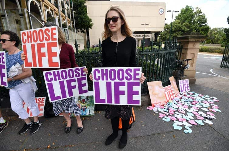 Anti-abortion activists protesting a bill to decriminalise the procedure in Queensland last year.