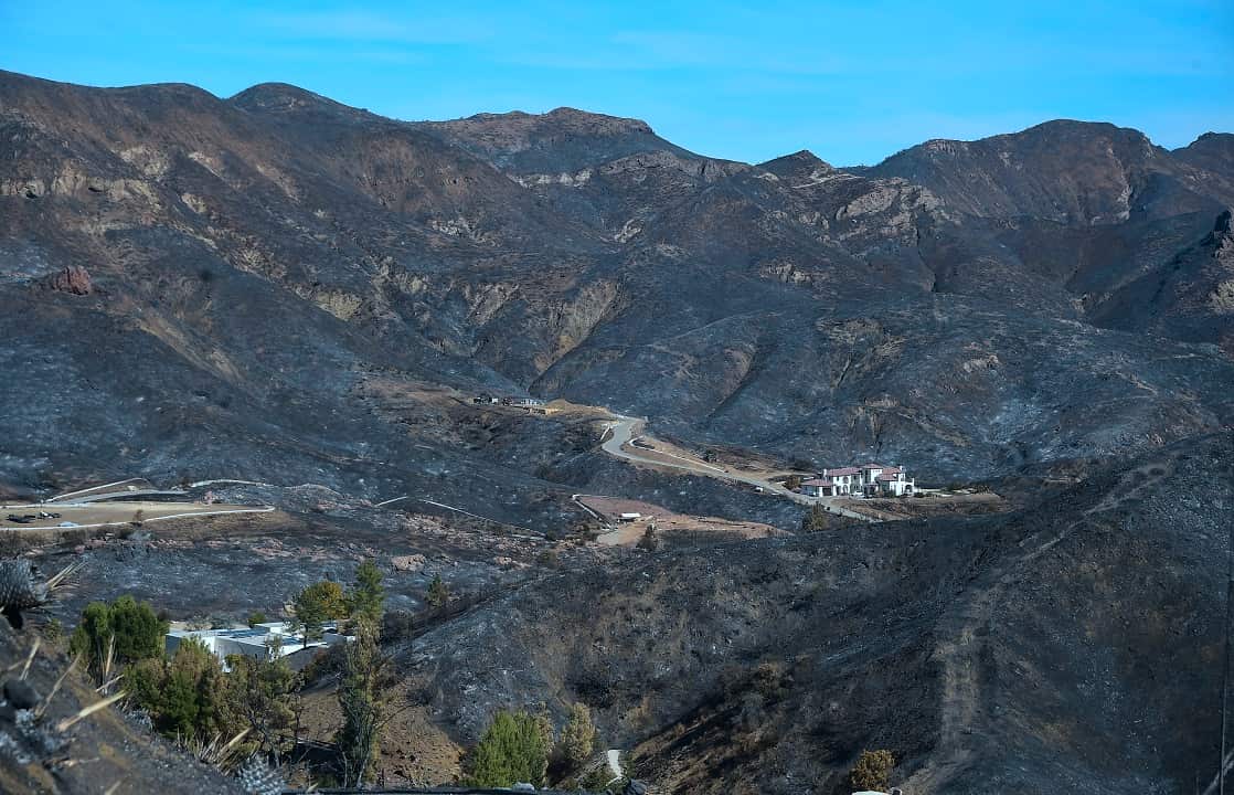 A canyon home was left untouched amid the surrounding charred and blackened hillsides from the Woolsey Fire along Lobo Canyon Road in California.