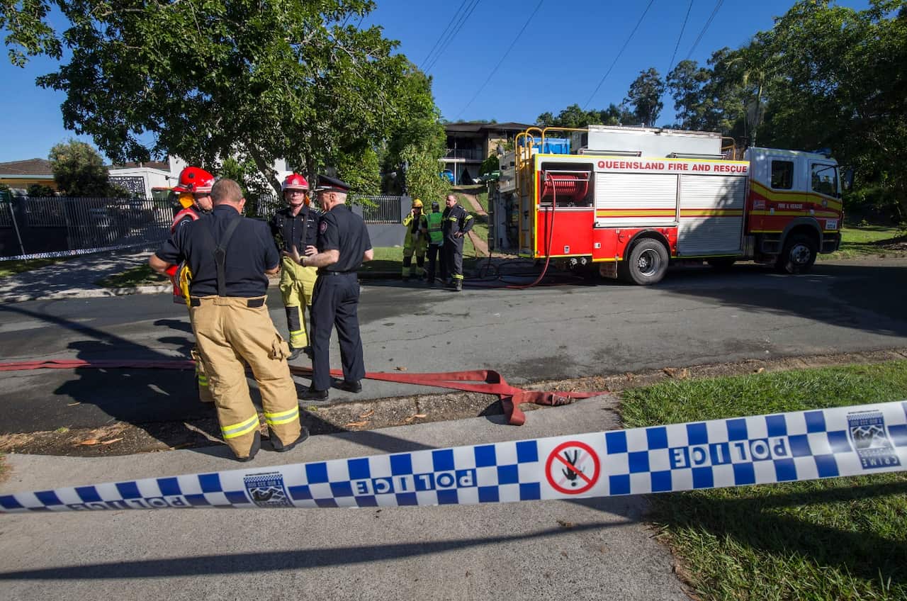Emergency services attend to the scene of an explosion at a house in Brisbane, Tuesday, April 17, 2018.