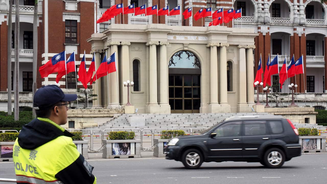 Taiwan's national flags fly outside the Presidential Office Building in Taipei, Taiwan.