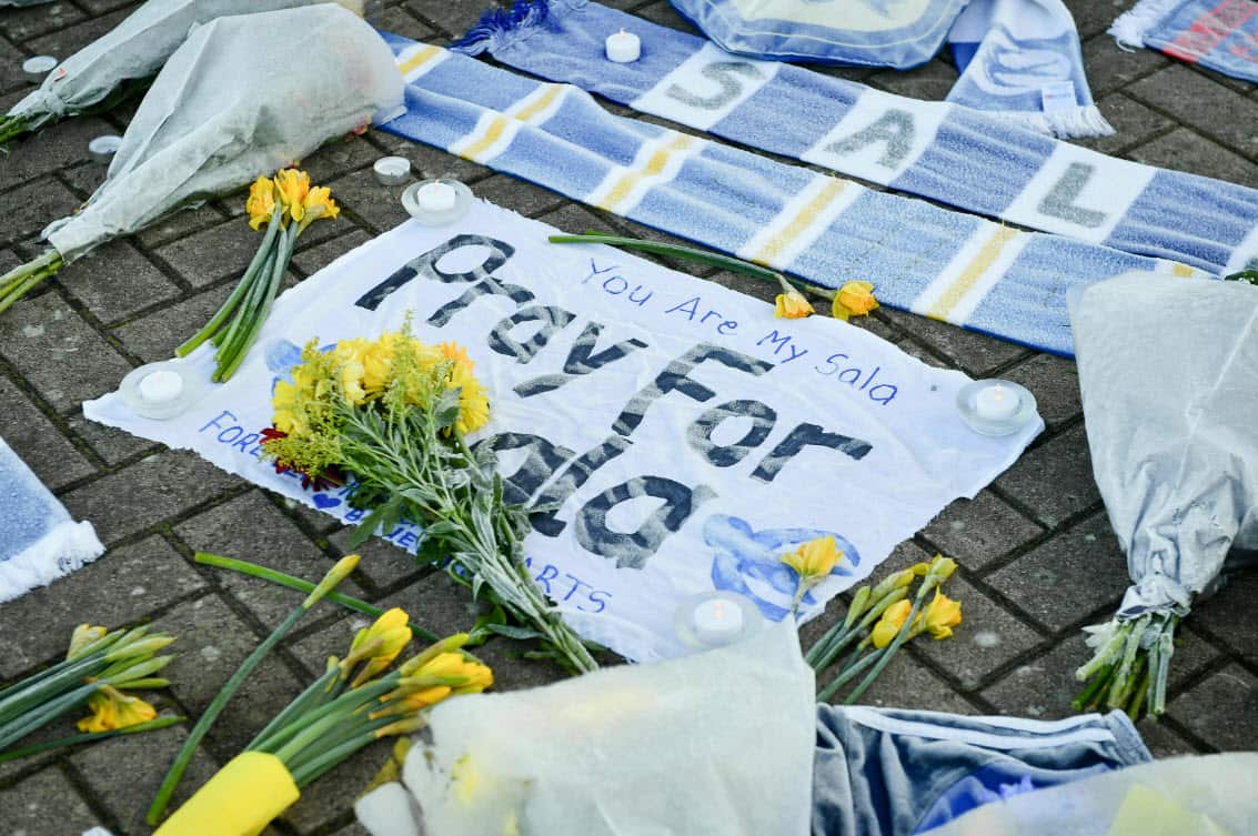 Flowers and tributes are placed outside Cardiff City Football Club, Wales (AAP)