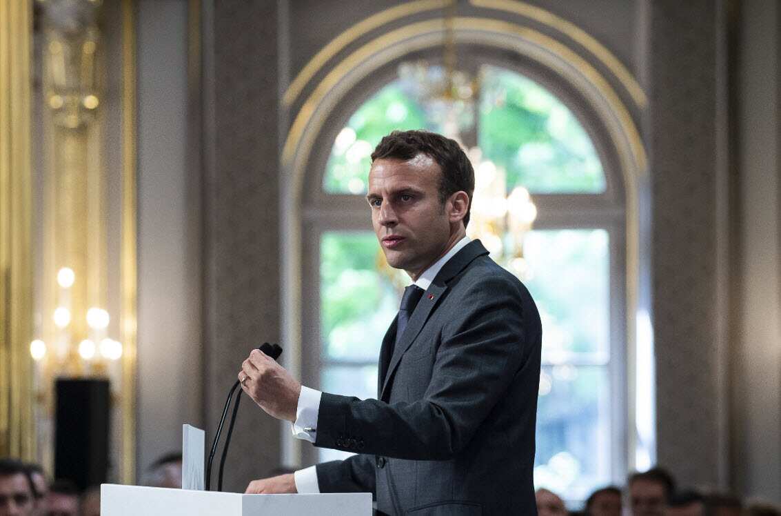 French President Emmanuel Macron delivers a speech during thanks to the firefighters who intervened at Notre dame de Paris Firefighters arrive at the Elysee palace on April 18, 2019 in Paris (AAP)