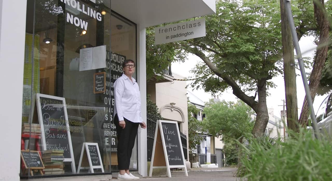 Martine waits for students to arrive at her language school, frenchclass.