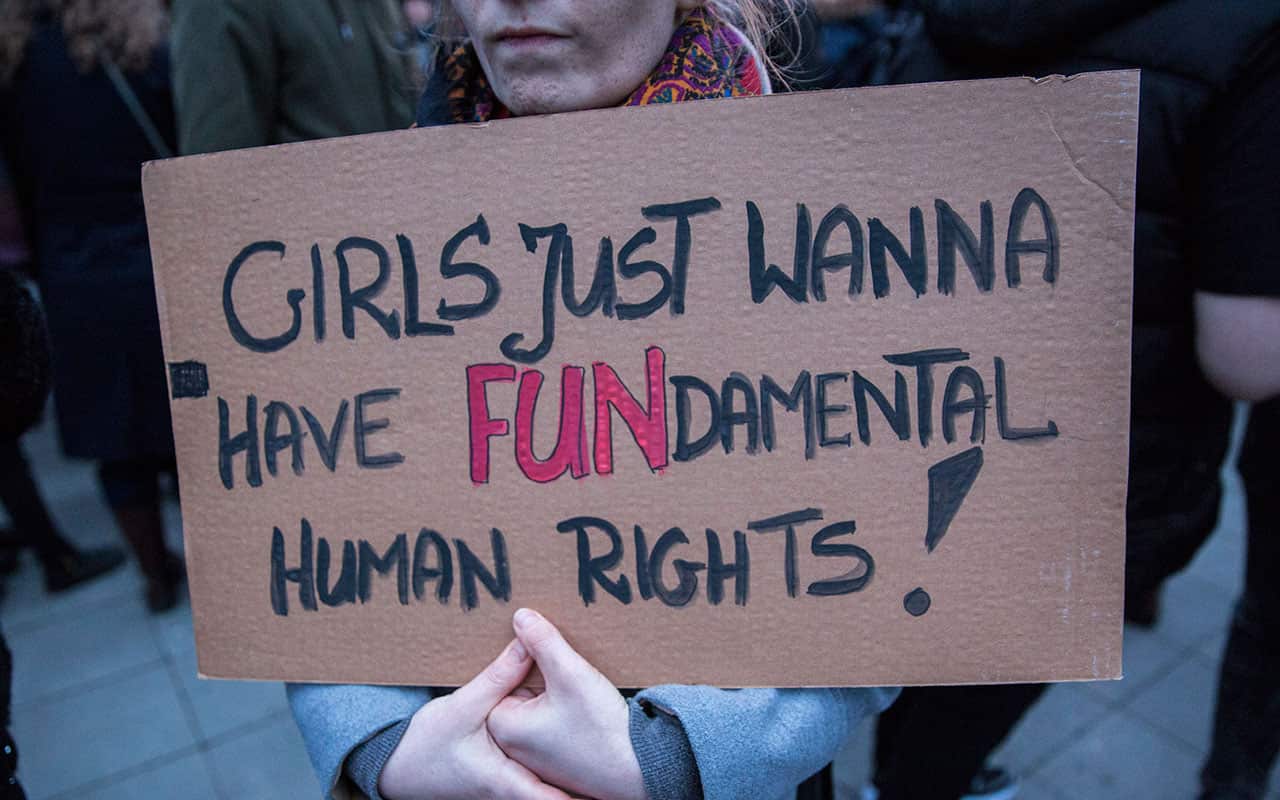 People take part in a 'Black Friday' protest to support a Polish Women's nationwide strike against the tightening of the abortion law in Berlin, Germany. 
