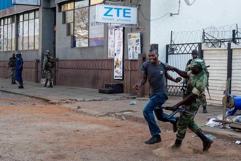 Bloody scenes as government forces round up suspected protesters earlier this week.