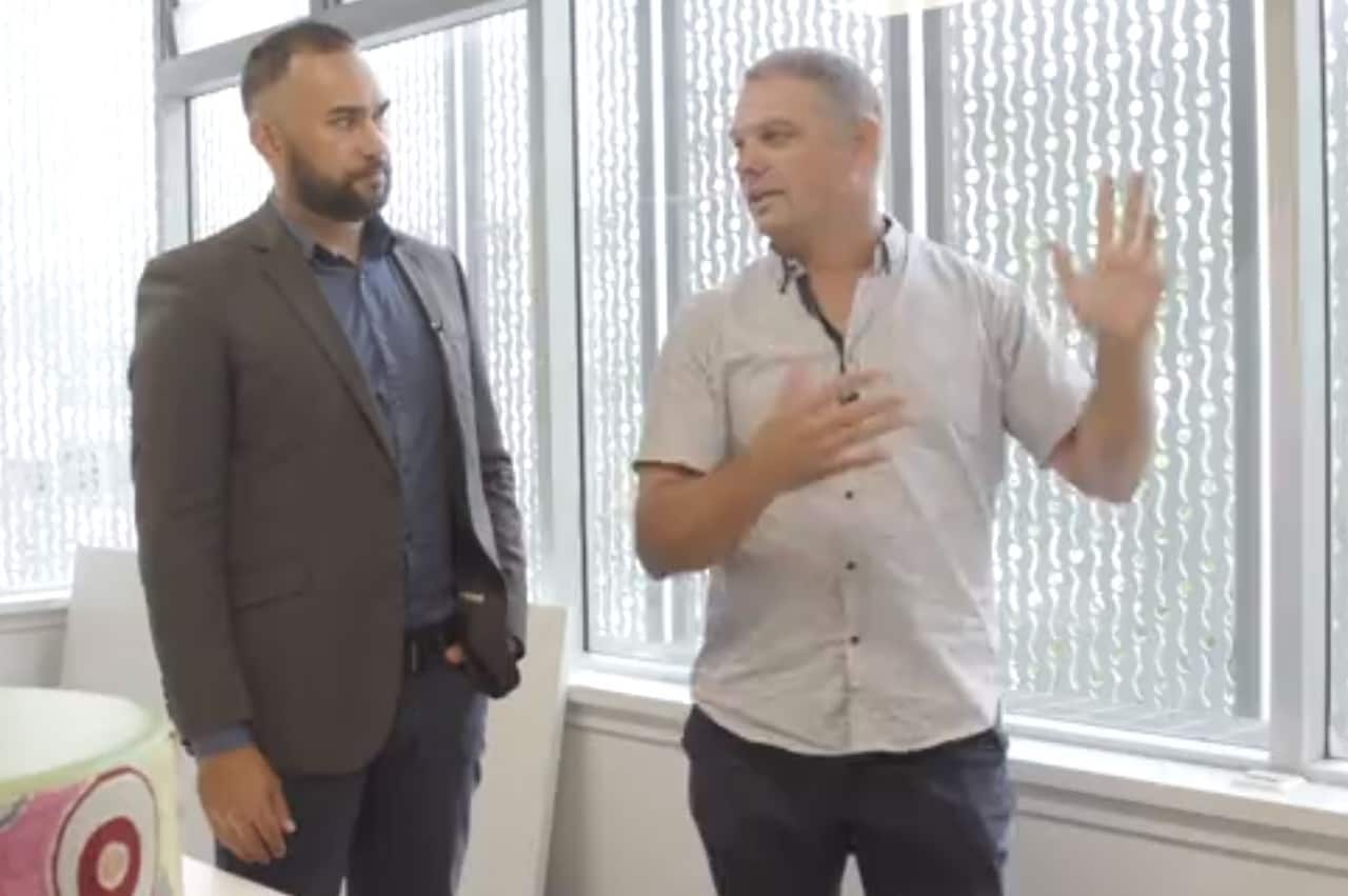 Builder Gavin Lester shows NITV's Ryan Liddle around he hub.