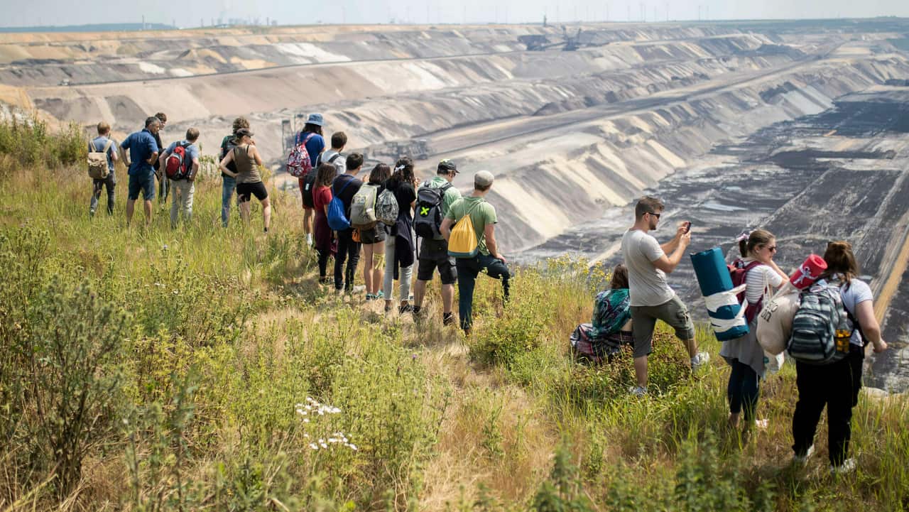 Protesters and police inside the mine accused each other of hostile behavior and injuries.