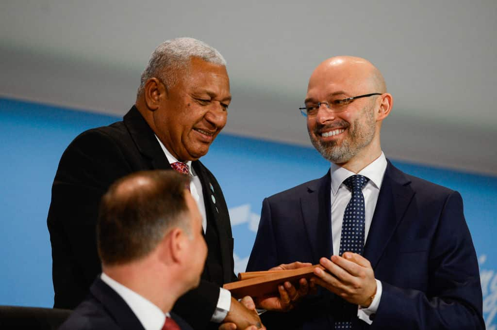 Michal Kurtyka, COP24 President and Secretary of State in the Ministry of Environment and COP23 President and Prime Minister of Fiji, Frank Bainimarama.