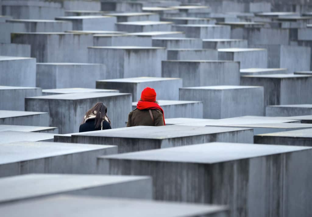 Two women at the Holocaust memorial in Berlin, Germany