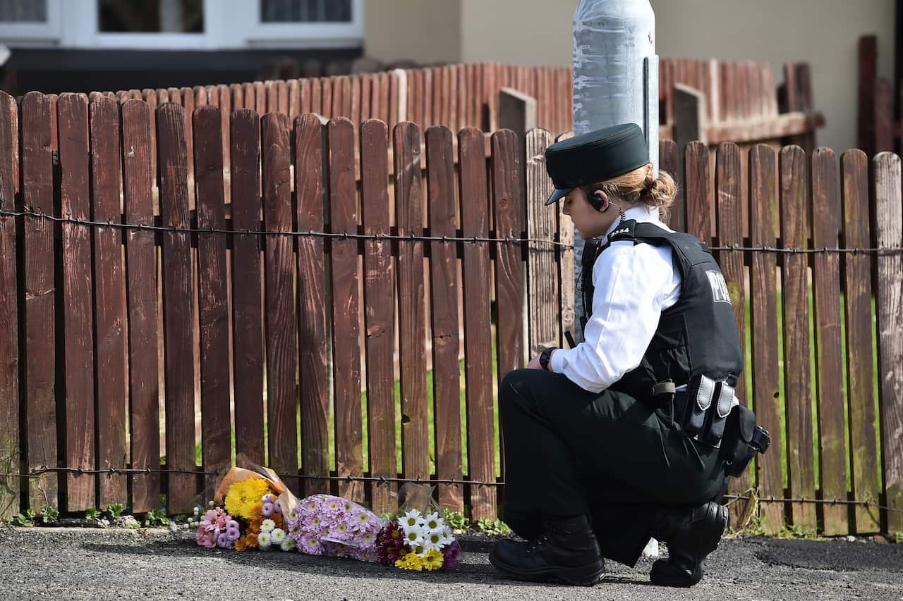 Police attend the scene of journalist Lyra McKee's shooting in Londonderry, Northern Ireland.