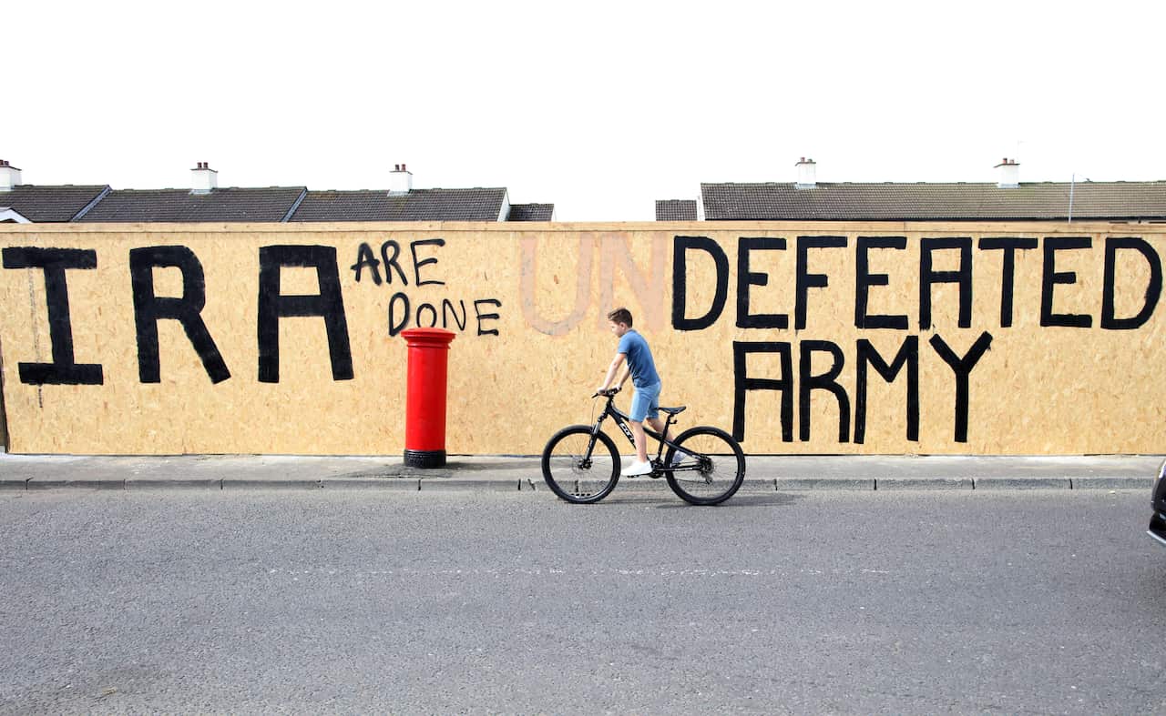 Graffiti has been amended to read "IRA are done. Defeated Army" instead of "IRA undefeated Army" in the Creggan area of Derry.