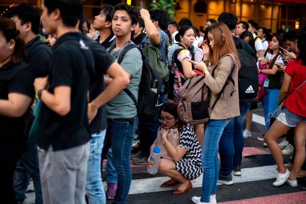 Office workers piled out onto the streets as emergency alarms blared.