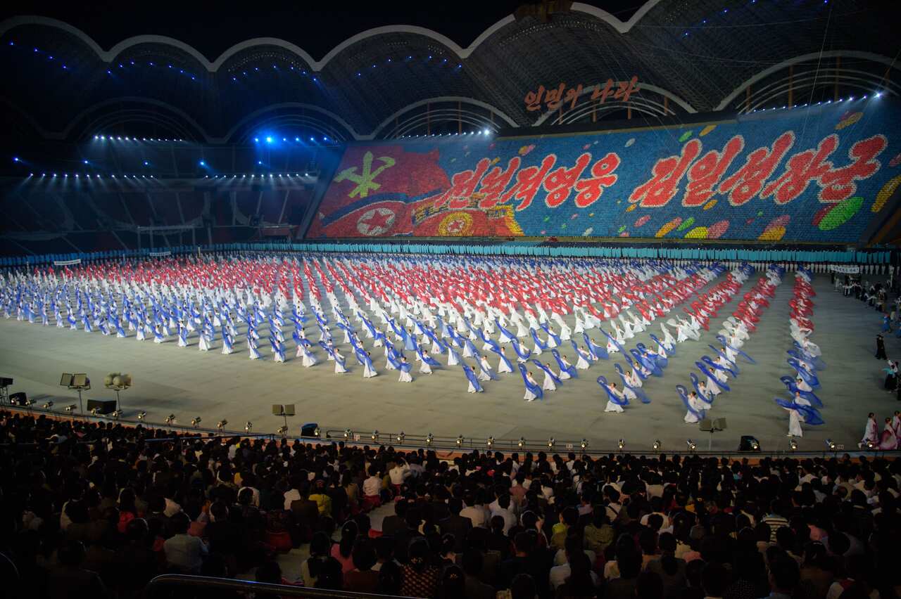 A photo taken on June 4, 2019 shows a 'Grand Mass Gymnastics and Artistic Performance', or mass games, at the May Day stadium in Pyongyang. - The "Grand Mass Gymnastics and Artistic Performance" features enormous numbers of people -- mostly students and c