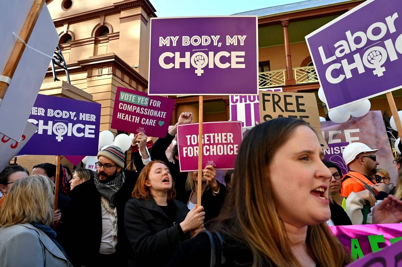 Pro-life and pro-choice advocates protest the bill.