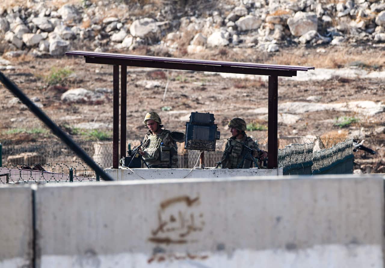 Members of the Turkish gendarmerie man an outpost along the border with Syria near the Syrian town of Atme in the northwestern Idlib.