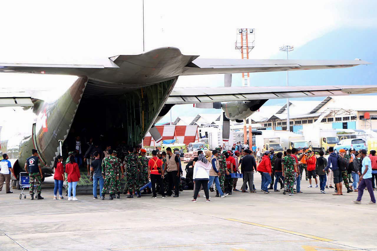 Indonesian military evacuates after unrest in Papua.