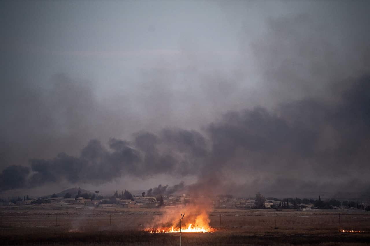 Smoke rises from the Syrian town of Tal Abyad.