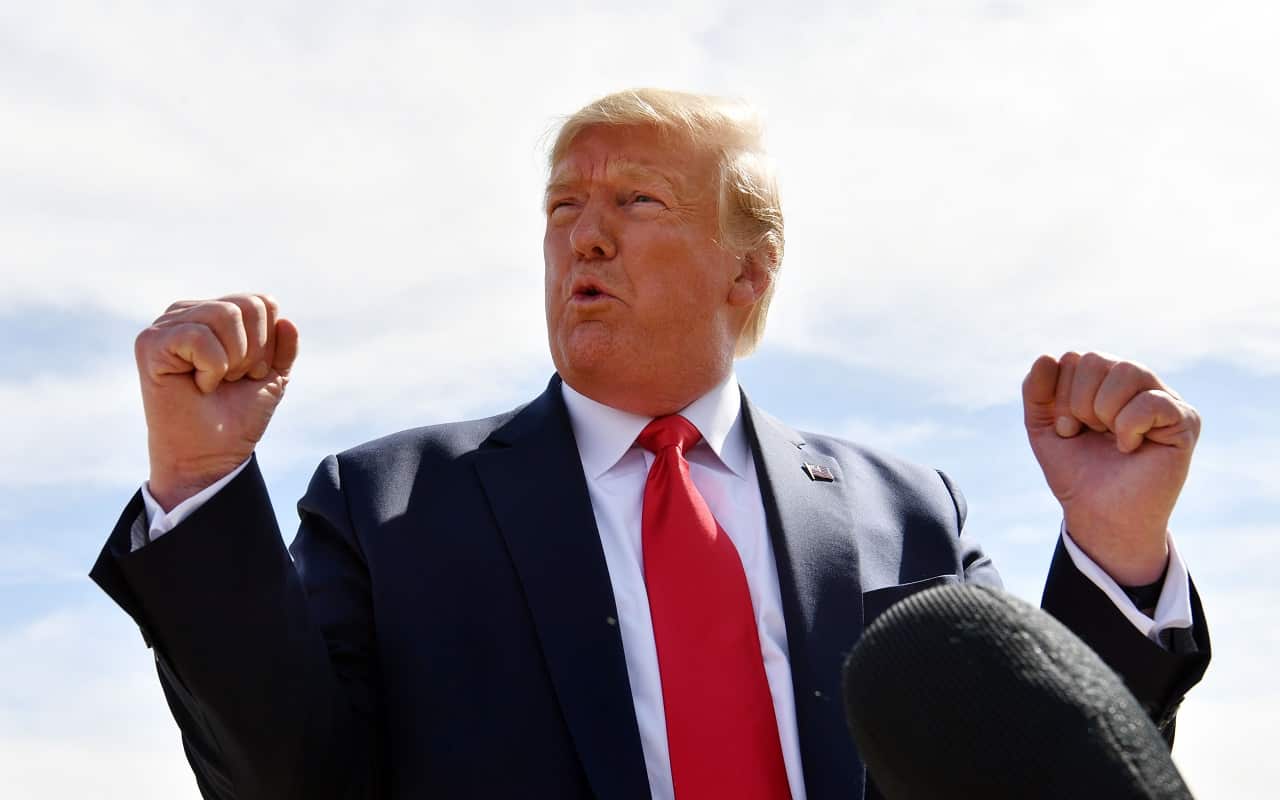 US President Donald Trump speaks to reporters in Texas.